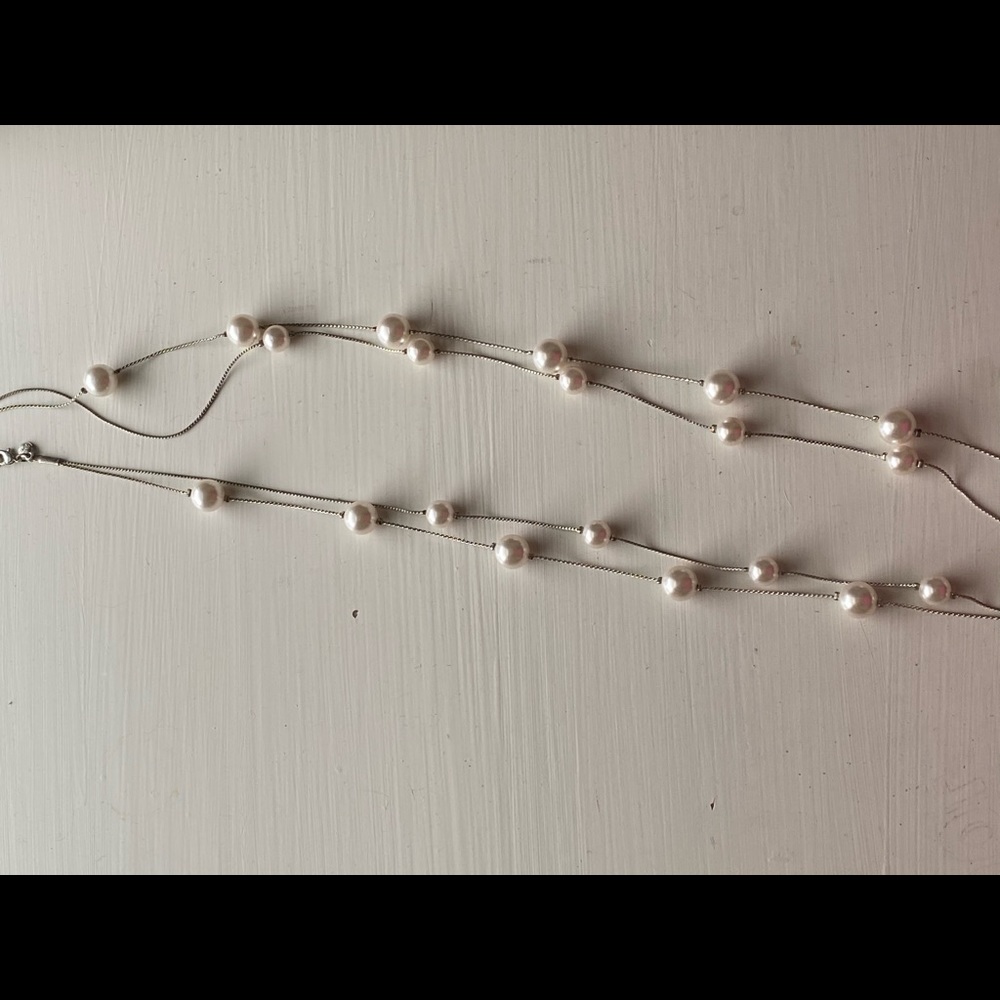 Long dangle pearl necklace